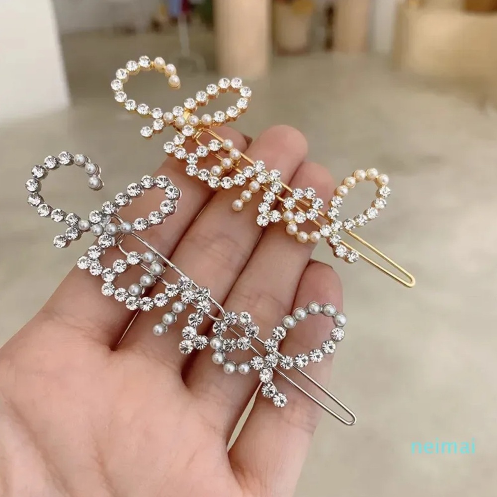 Chanel I.n.s.p.i.r.e.d. Gold Crystal Hair Clip New in package!So cute & classy!!